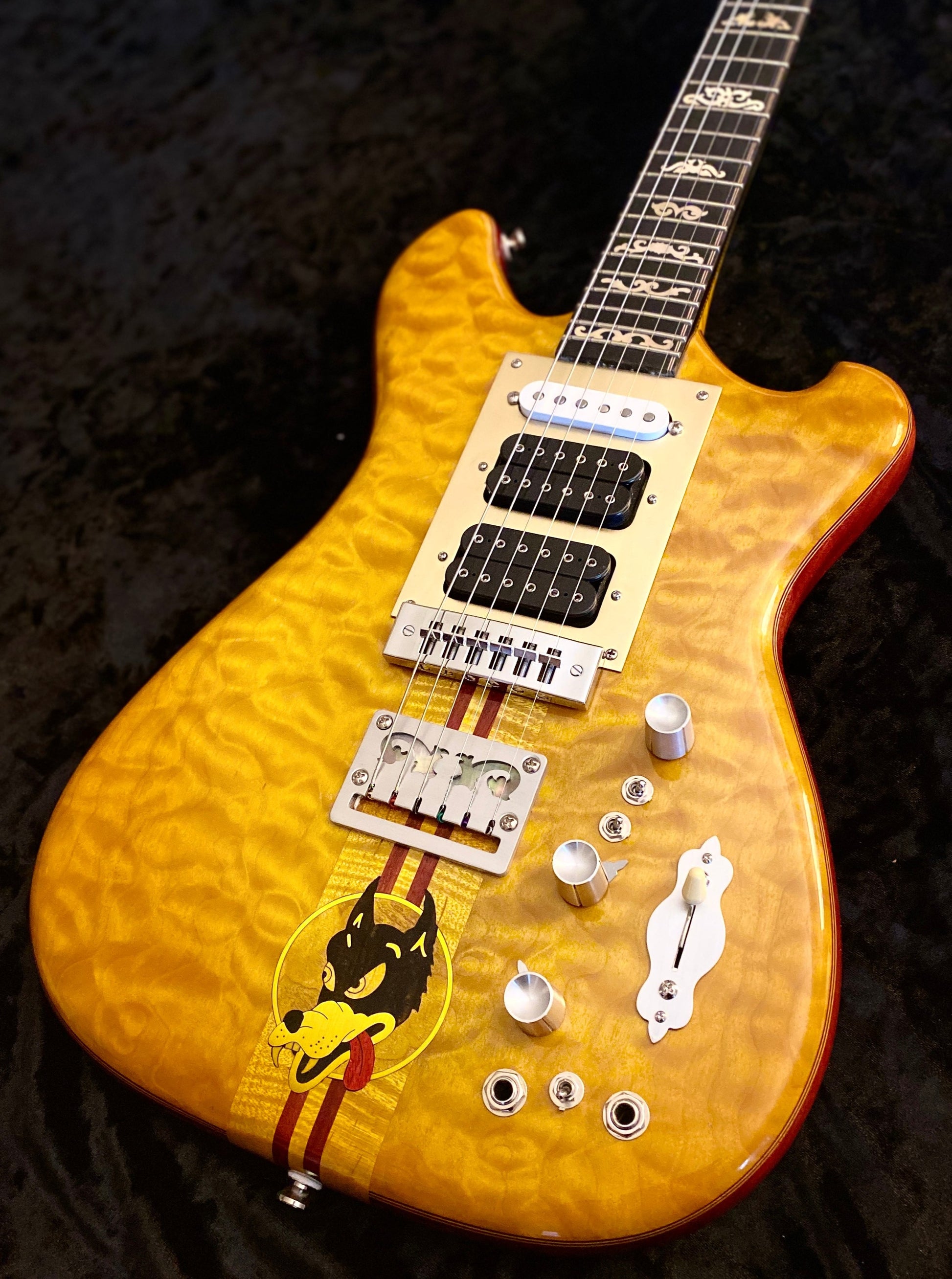 Detailed view of the Wolf guitar